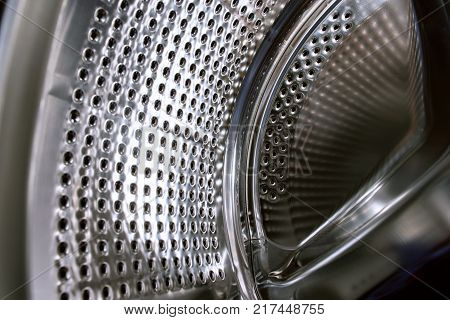 chrome-plated washing machine drum from the inside