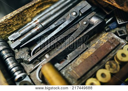 Tools and accessories of jewelers used for crafting precious metals