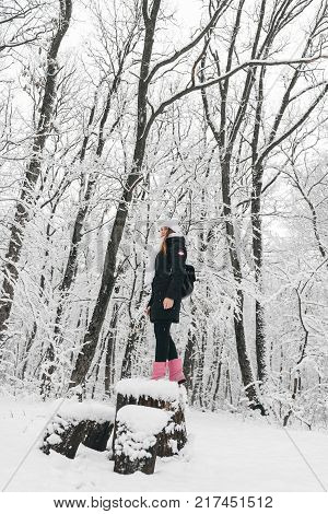Beautiful Young Girl In A White Winter Forest