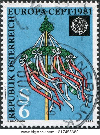 AUSTRIA - CIRCA 1981: A stamp printed in Austria shows a Maypole (Maibaum) circa 1981