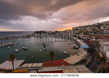ATHENS, GREECE - DECEMBER 04, 2017: Evening in Mikrolimano marina in Athens, Greece on December 04, 2017.