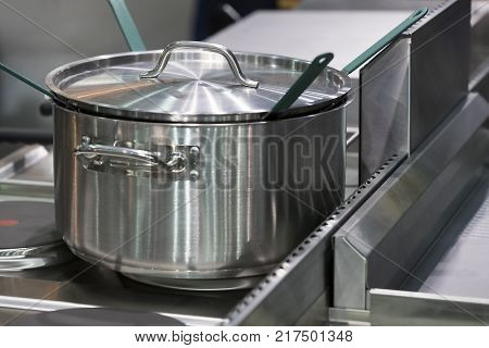 Metal stainless steel pan on a kitchen stove
