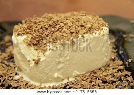 Chocolate Ice Cream And Hardered Chocolate Over
