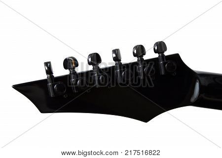 The head of the neck of the black electric guitar from the side of the machine heads. Isolated.