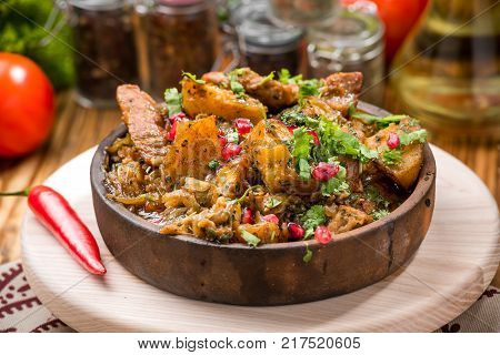 Roast beef with potatoes on a plate