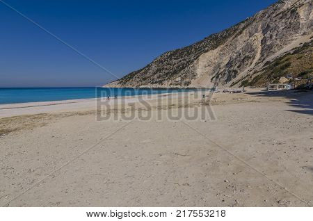 panoramic view of myrtos beach its turquoise sea and the mountains that plummet kefalonia