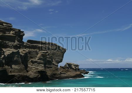 Steep cliffs at Papakolea Green Sand beach on Big Island, Hawaii