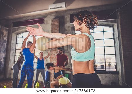 Athletes Training In A Gym