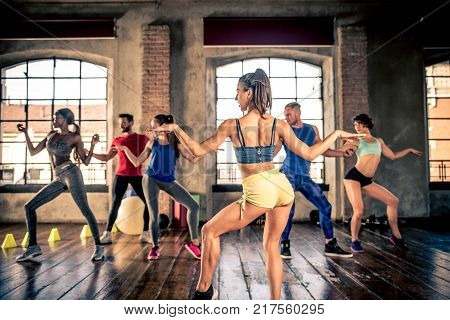 Athletes Training In A Gym