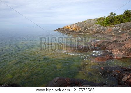 Rocky coast of Gangut in the morning of June. Hanko, Finland