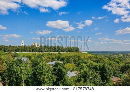 the view from the hill to the Cathedral of the assumption and the observation deck in Vladimir. summer landscape in the background. the Golden ring of Russia
