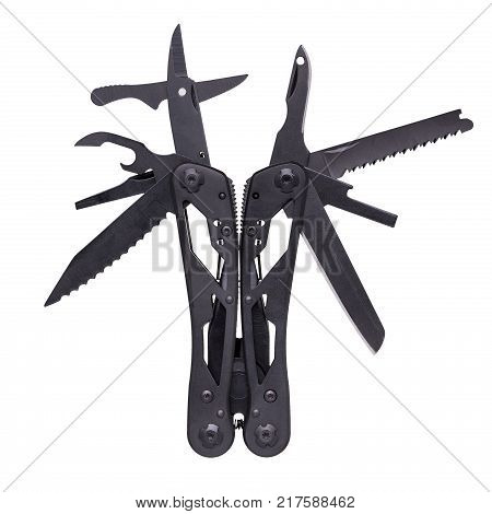 Black multi tool photographed on a white background. The multitool is with all of its instruments: scissors a saw blade a screwdriver attachment an opener a knife and others