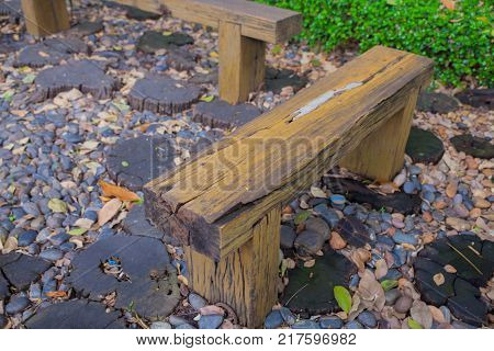 Wooden bench in the garden at thailand