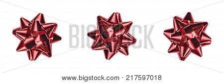 A holiday symbol, an element of decor. Red bow isolated on white background.