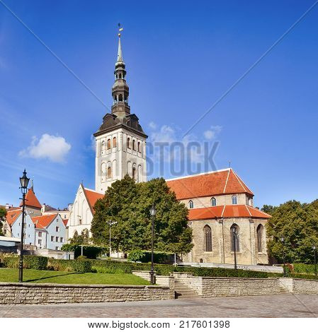 View of St. Nicholas Church Niguliste kirik in old town of Tallinn at sunny day.