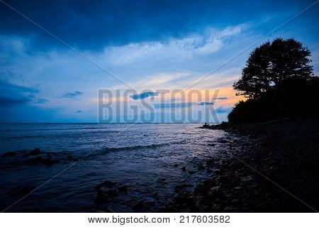 Blue twilight after sunset at the sea