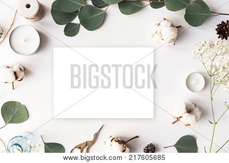 Stylish branding mockup to display your artworks. Cute vintage mock up on wooden background. Flat lay top view.