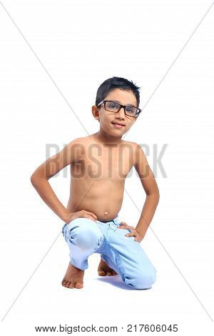 young happy indian boy showing his muscle