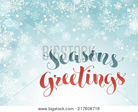 Winter holidays snowy background. Falling snowflakes on blue sky. Abstract corner frame composition. Magical Christmas backdrop. New Year greeting card template with copyspace.