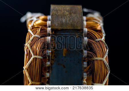 Parts For An Electric Motor On A Wooden Table. Stator Of The Engine On A Wooden Workshop Table.