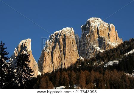Beautiful view of Sassolungo (Langkofel) group in the Dolomites as seen from Campitello di Fassa. Val di Fassa, Italy