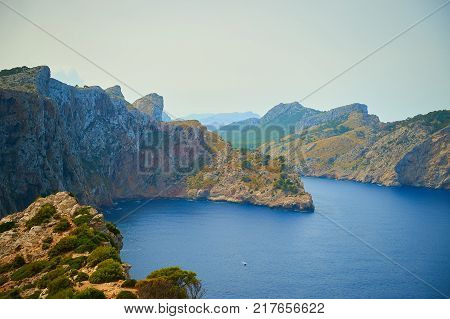 View from the top of the cliff to the bay in rocks