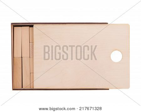 Wooden half-open, square box, for children's geometric shapes, with a round hole, inside lie wooden geometric shapes, isolated on white background.