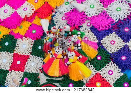 Handmade jute dolls colourful handicrafts on during Handicraft Fair in Kolkata - the biggest handicrafts fair in Asia.