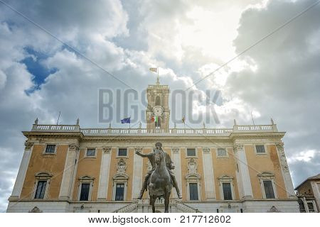 the bronze equestrian statue of Marco Aurelio (Marcus Aurelius) with the Campidoglio Palace in the distance in Rome