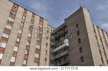 Old apartment building closeup. Old hostel. Old architecture