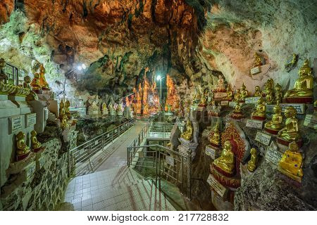 PINDAYA, MYANMAR - JANUARY 25, 2016 : Buddha statues inside the Shwe Umin Pagoda Paya, Myanmar. Pindaya Caves are a famous Buddhist pilgrimage site and a tourist attraction. HDR processed.