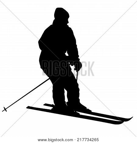Mountain skier speeding down slope. Vector sport silhouette.