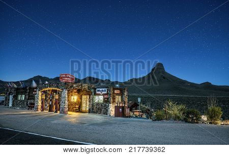 COOL SPRINGS, ARIZONA, USA - MAY 19, 2016 : Night sky with many stars above rebuilt Cool Springs station in the Mojave desert on historic route 66 in Arizona