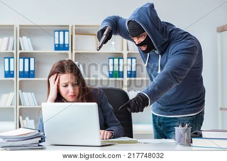 Criminal taking businesswoman as hostage in office