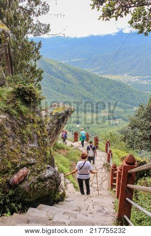 Paro Bhutan - September 18 2016: Tourists on the way back from Taktshang Palphug Monastery (the Tiger's Nest) Bhutan Asia