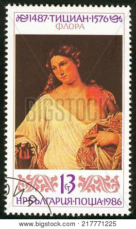 UKRAINE - circa 2017: A postage stamp printed in Bulgaria shows painting by Titian Flore Series 500th Birthday of Titian circa 1986
