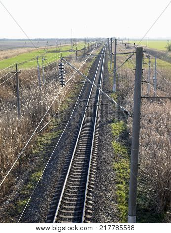 Plot Railway. Top View On The Rails. High-voltage Power Lines For Electric Trains.