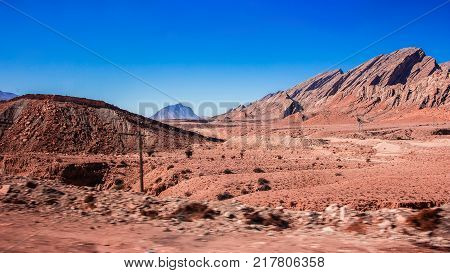 View of the iranian red desert mountains.