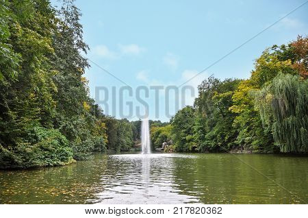 Beautiful landscape Fountain Snake and Flora Pavilion on background in the National Arboretum Sofiyivka Uman Ukraine