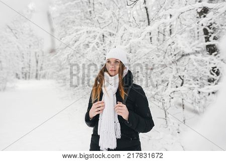 Beautiful Young Girl In A White Winter Forest