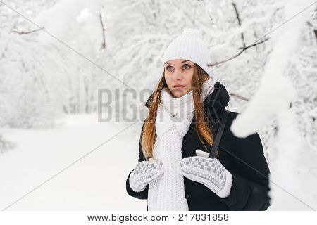 Beautiful Young Girl In A White Winter Forest