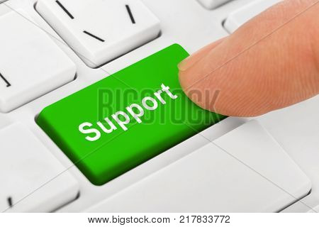 Computer notebook keyboard with Support key - technology background