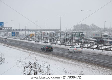 Hemel Hempstead UK - December 10 2017:Traffic on the British motorway M1 during the snowstorm