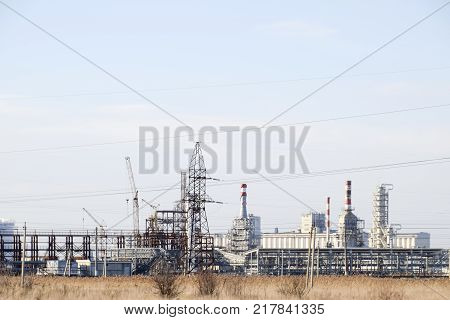 Distillation Columns, Pipes And Other Equipment Furnaces Refinery. The Oil Refinery. Equipment For P