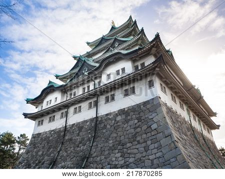 The main tower (Tenshu) of Nagoya Castle over blue sky