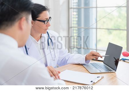 Doctor and Patient are consulting about health proplem.