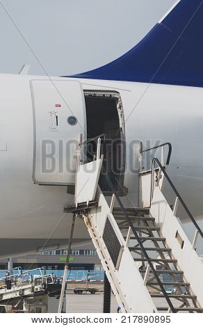 Welcome Aboard. The Open Door In The Plane.