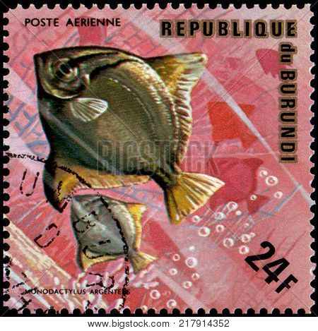 REPUBLIC OF BURUNDI - CIRCA 1974: a postage stamp, printed in Burundi, shows a fish Silver Moony (Monodactylus argenteus)