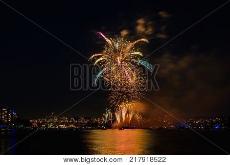 Celebration multicolored fireworks copy space. Canada Day holidays salute. New Year celebration colorful fireworks.
