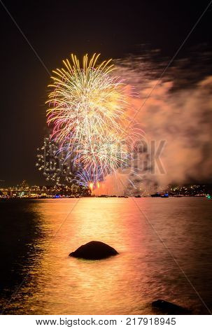 Celebration multicolored fireworks copy space. Canada Day holidays salute. New Year celebration colorful fireworks.